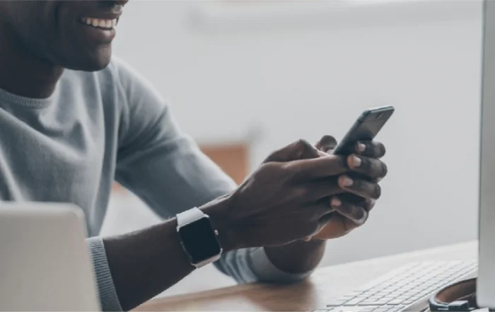 Person holding mobile phone